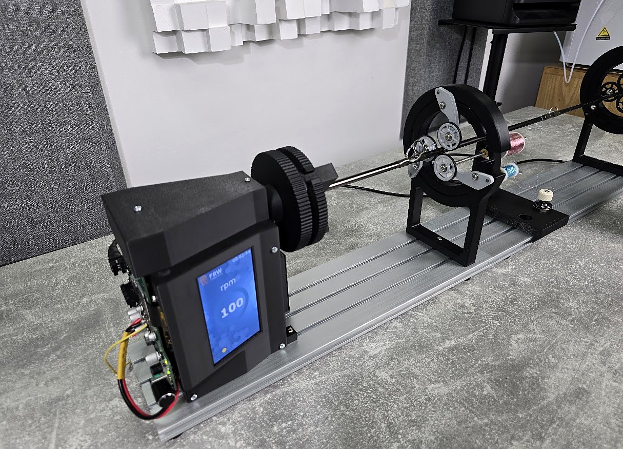 FRW4 prototype with a rod held by the roller rod support and thread spools
